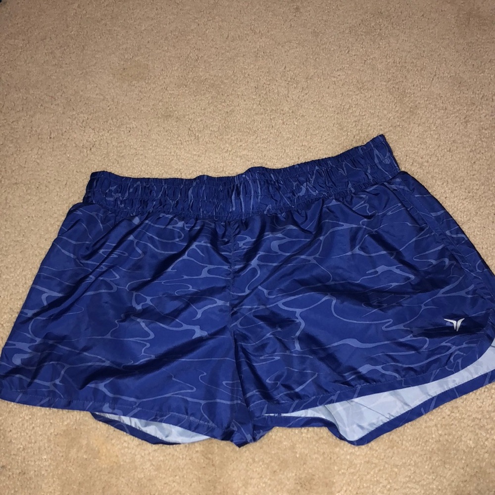 purple running shorts
